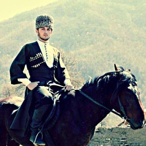 Traditional Chechen man on a horse